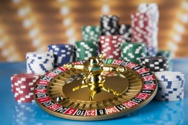 Mobile device showing 12naga payment methods including QRIS and DANA for Singapore Pools deposits